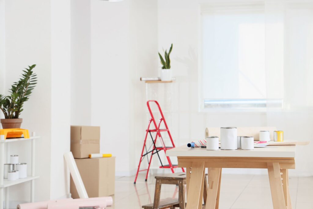 Image of the interior of a room with repair materials that is refurbished for sale.