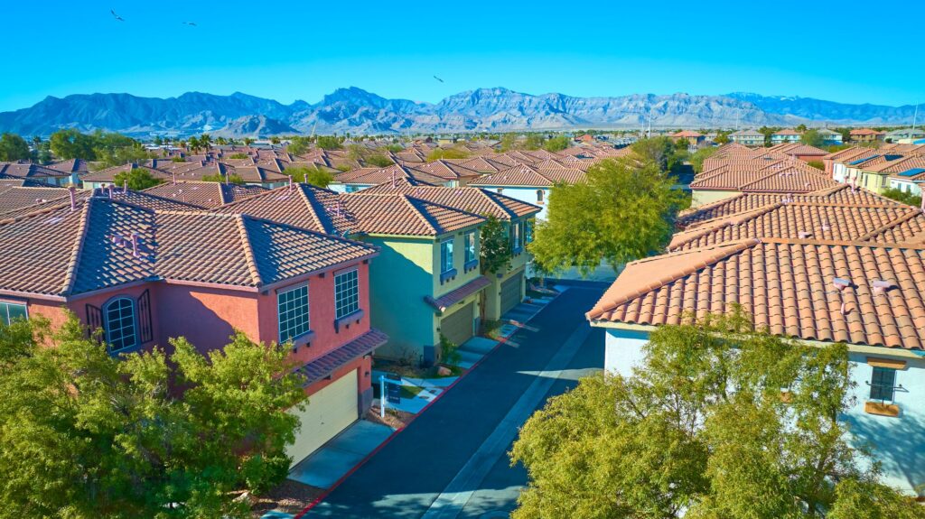 An aerial image of houses in a suburban neighborhood with mountain views in Nevada.